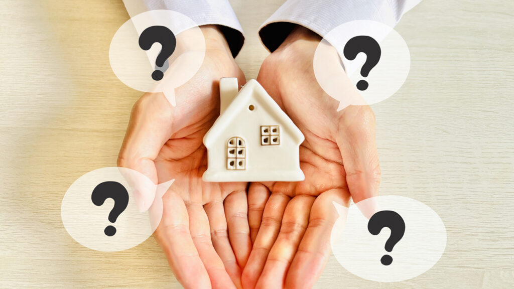 疑問を浮かべる家の画像